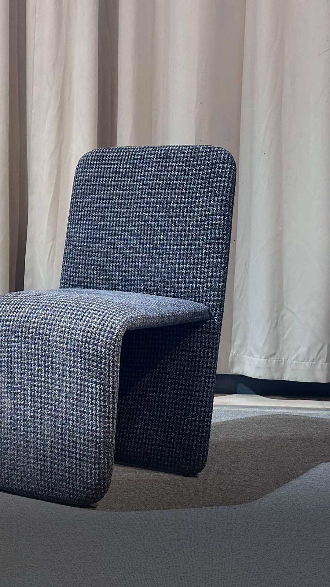 Sculptural grey lounge chair
