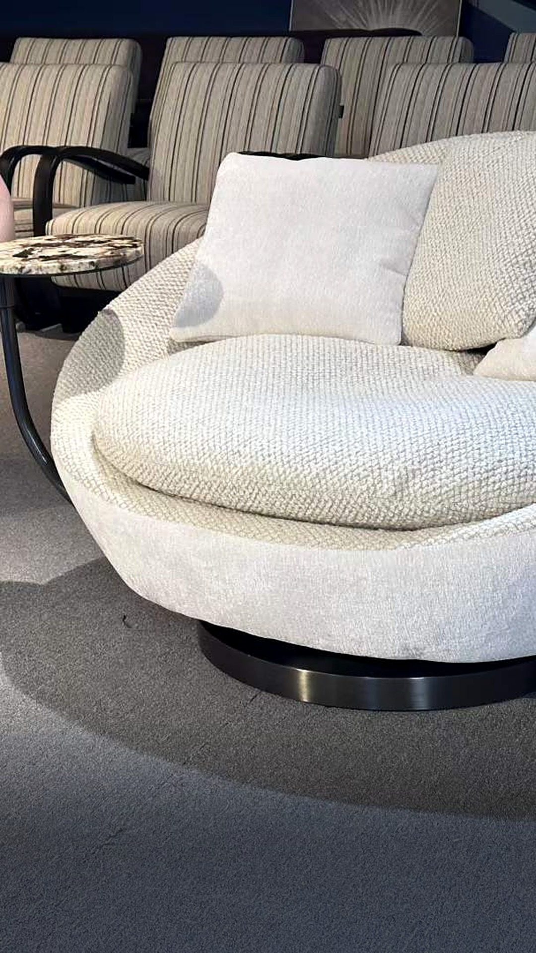 White swivel lounge chair